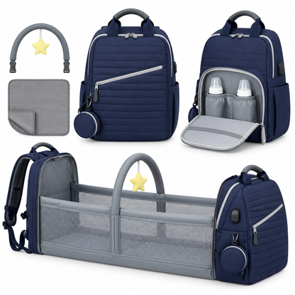 NappyGo Wickelrucksack in Marineblau mit Spielbogen und aufgeklapptem Babybett